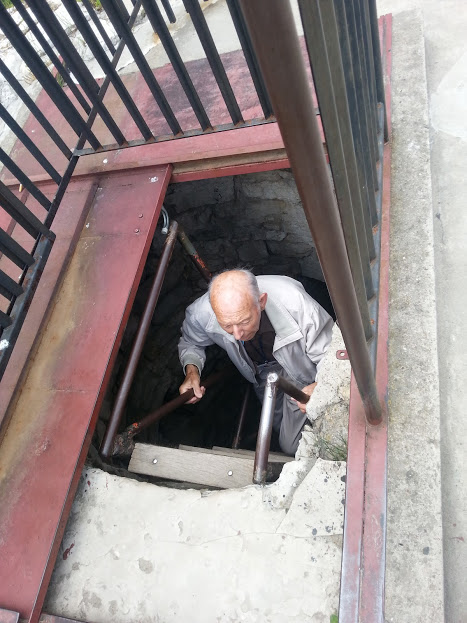 Exploring an ancestral cellar during a roots visit